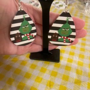 Grinch Earrings. (2) sided made of thick faux leather.